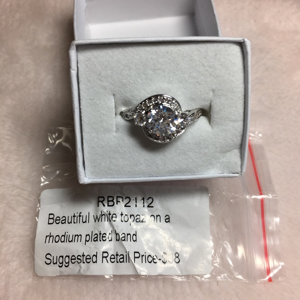 Sz 7 white topaz On rhodium plated band ring